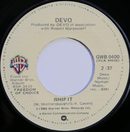 Devo – Whip It / Girl U Want (7")